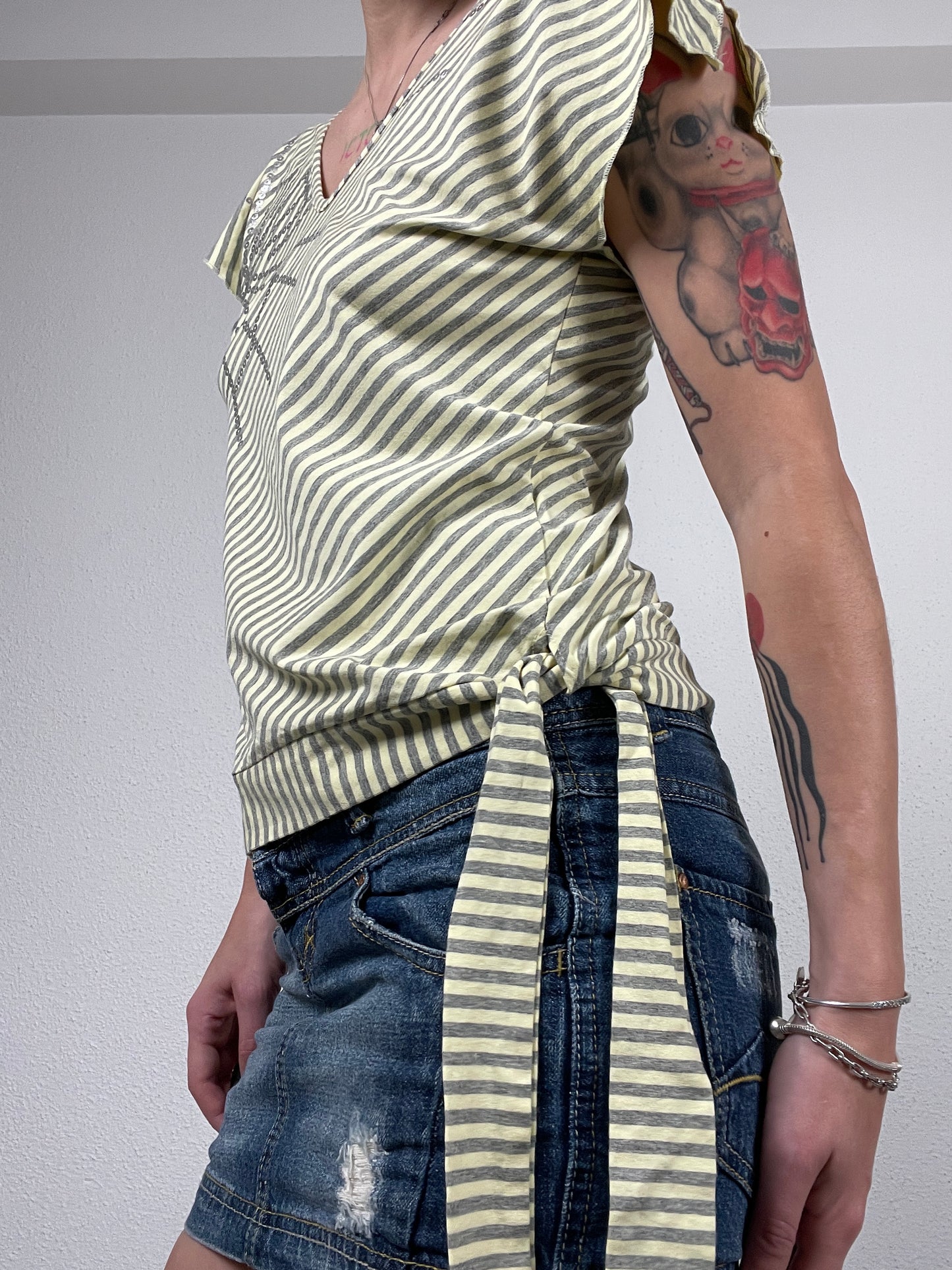 Vintage early 2000s yellow & grey striped sequin wrap top by Amaranto