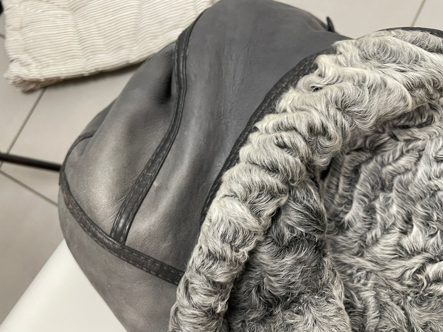 Vintage ’90s reversible genuine leather & curly shearling coat.