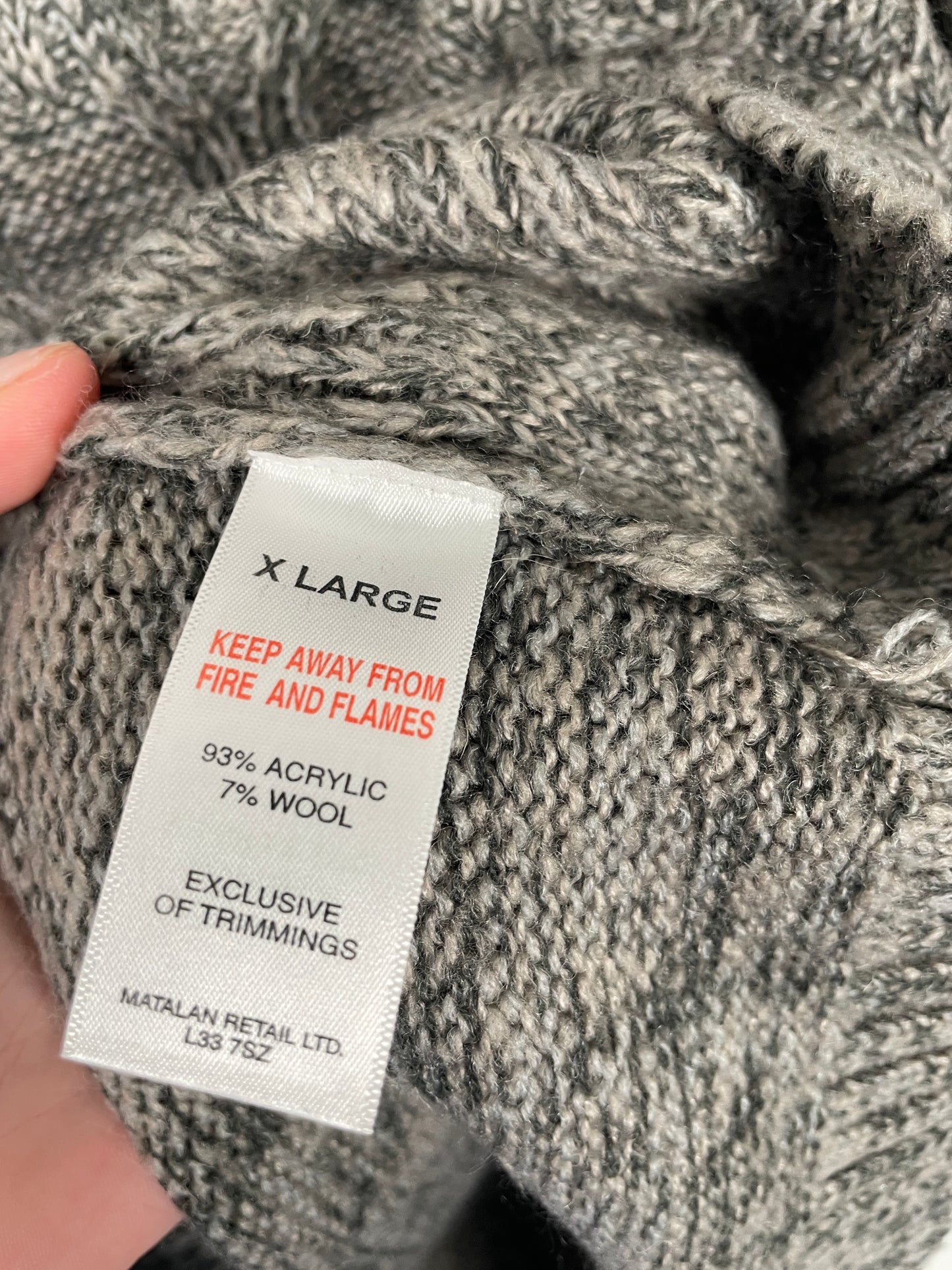 Grey cable-knit sweater by AW85.