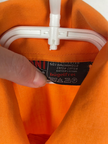 1970s bright orange statement-collar shirt (size XS)