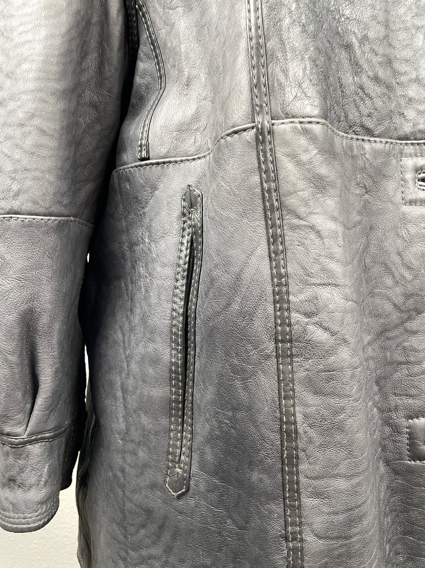 Vintage ’90s reversible genuine leather & curly shearling coat.