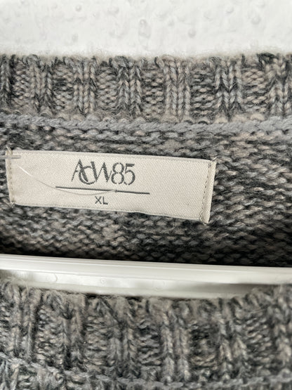 Grey cable-knit sweater by AW85.