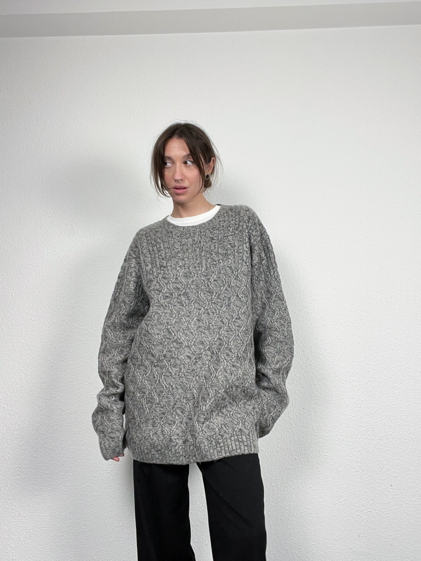 Grey cable-knit sweater by AW85.